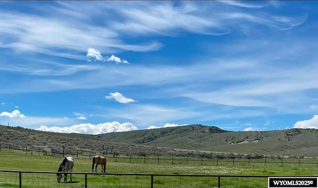 view of mountain feature featuring a rural view