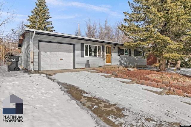 single story home featuring a garage