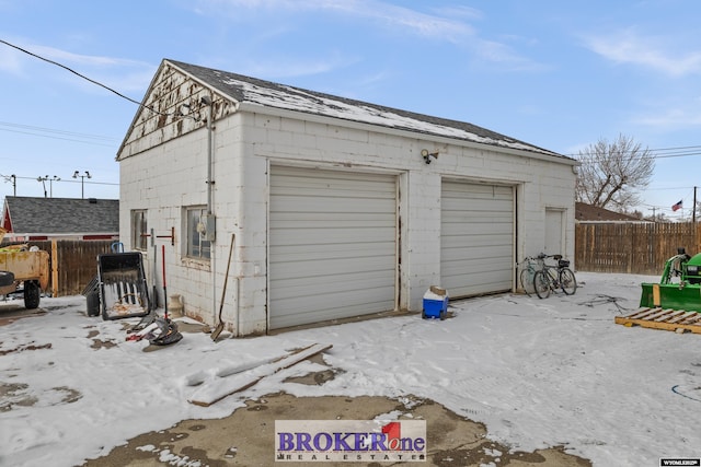 detached garage with fence