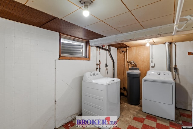 laundry room with washing machine and dryer and laundry area