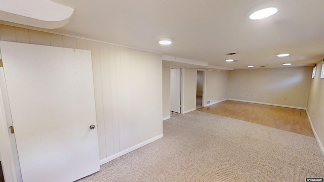 finished basement featuring carpet and baseboards