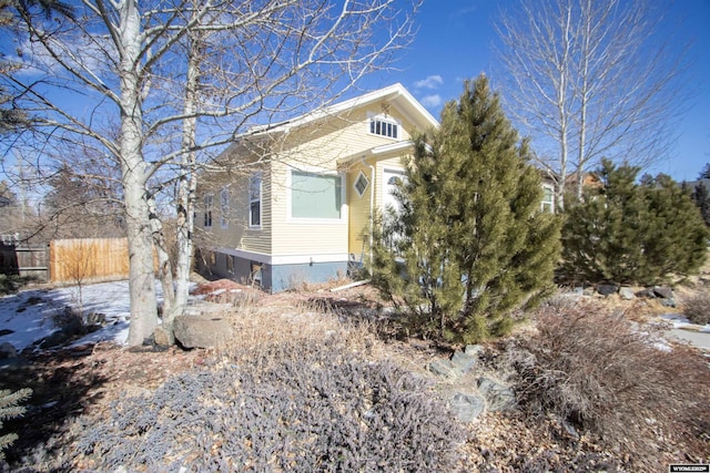 view of front of home with fence