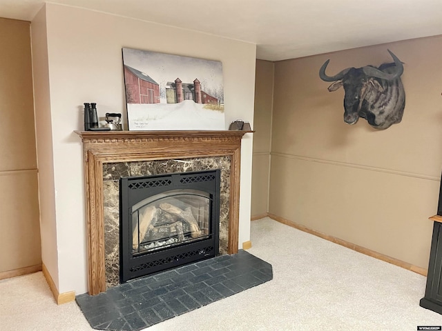 details featuring carpet floors, a high end fireplace, and baseboards