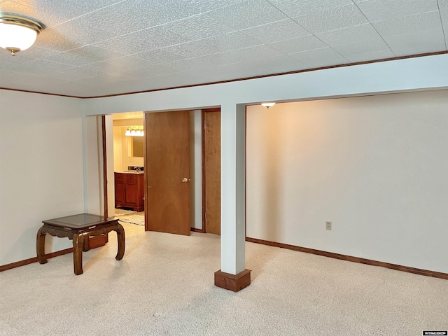 finished basement featuring baseboards