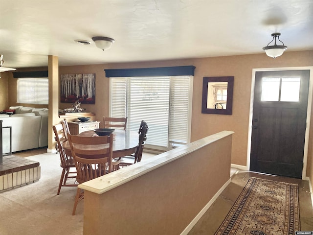 dining area featuring baseboards