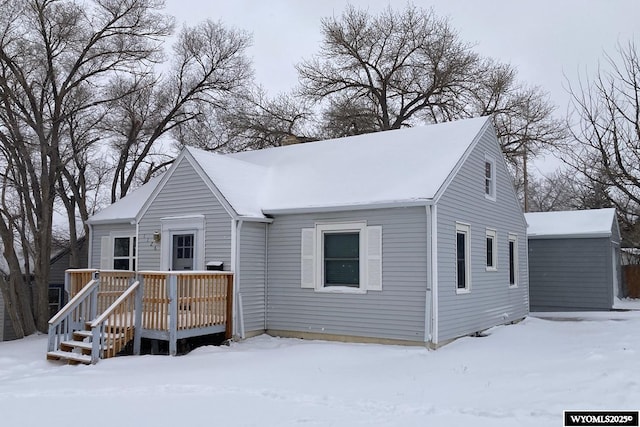 view of front of house with a wooden deck