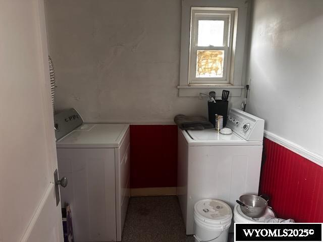 laundry area featuring laundry area and washer and dryer