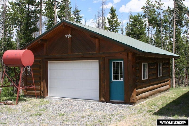 garage with driveway