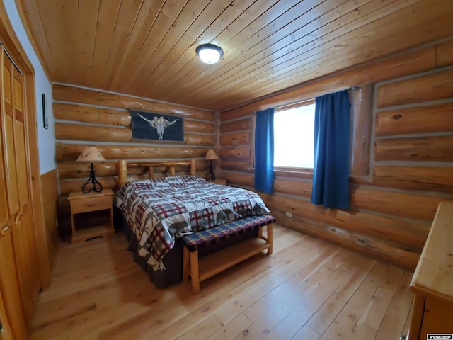 bedroom with wooden ceiling, log walls, and light wood finished floors