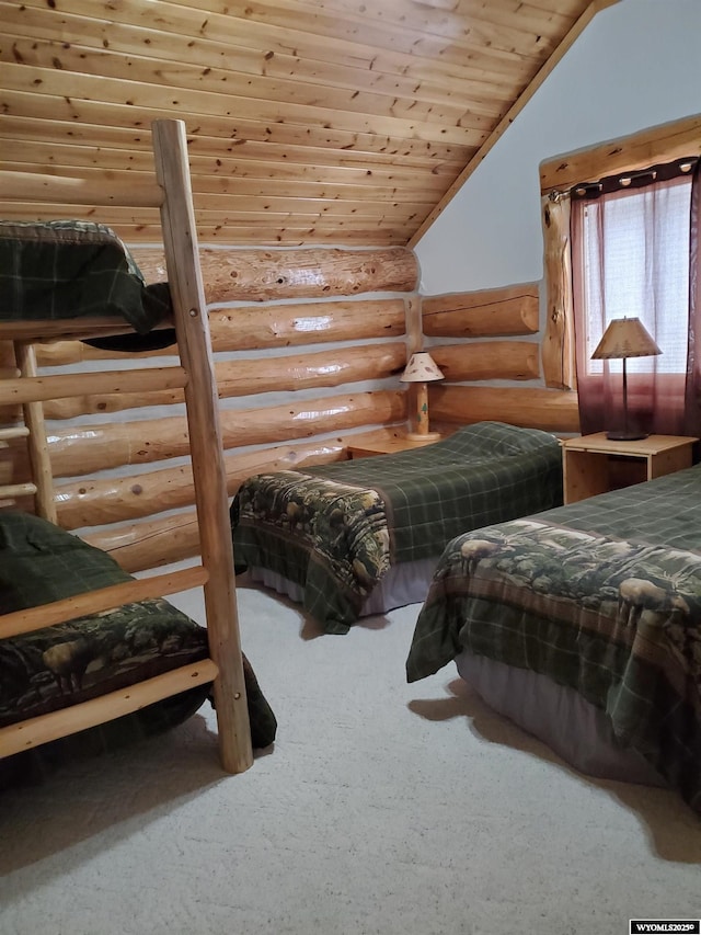 carpeted bedroom featuring wood ceiling and vaulted ceiling