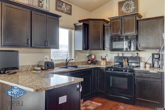 kitchen with dark wood-style flooring, a sink, dark brown cabinets, light stone countertops, and black appliances