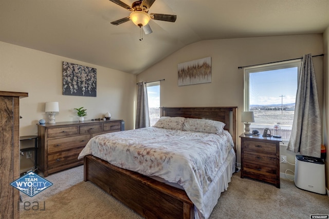 bedroom featuring light carpet, ceiling fan, and lofted ceiling