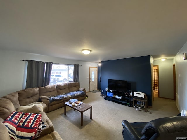 living area featuring light colored carpet