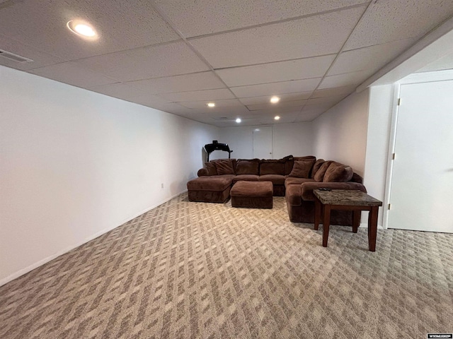 living room with carpet floors, a paneled ceiling, visible vents, and recessed lighting