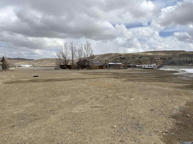 view of yard with a mountain view