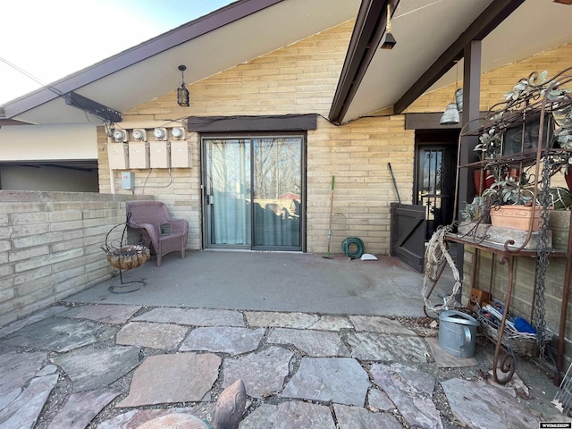 view of patio / terrace featuring fence