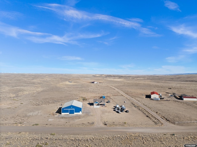 aerial view featuring a rural view and a desert view