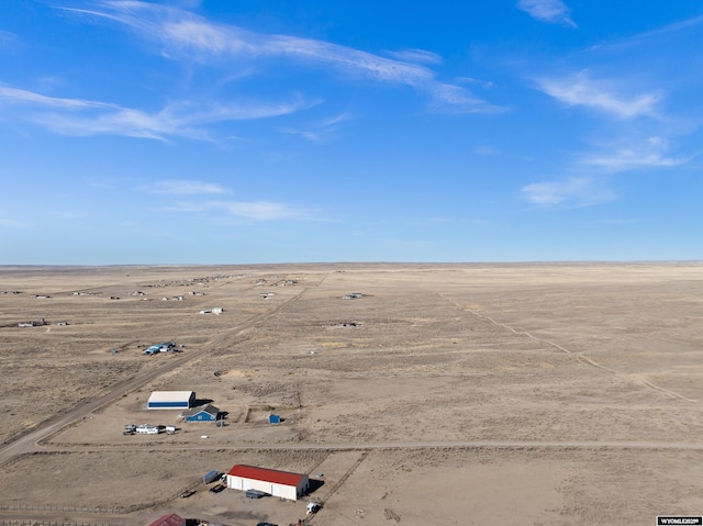 drone / aerial view with a desert view