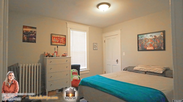 bedroom featuring radiator