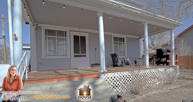 wooden terrace with covered porch