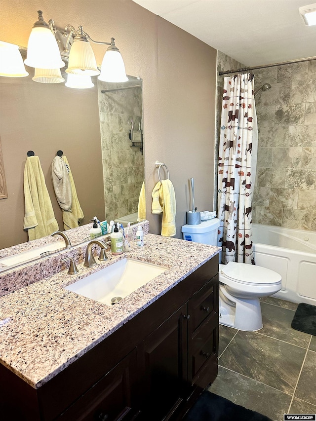 bathroom with vanity, shower / bath combo with shower curtain, and toilet