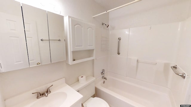 bathroom featuring shower / washtub combination, vanity, and toilet