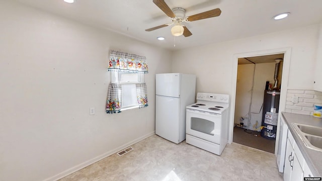 kitchen featuring ceiling fan, white appliances, visible vents, and white cabinets