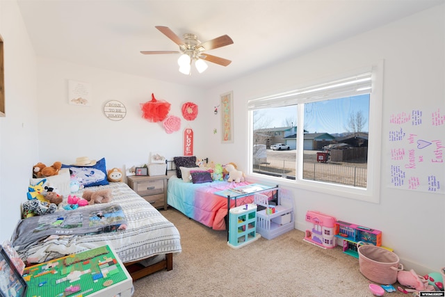 bedroom featuring carpet and a ceiling fan