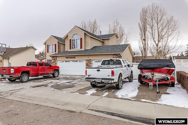 traditional-style home with concrete driveway