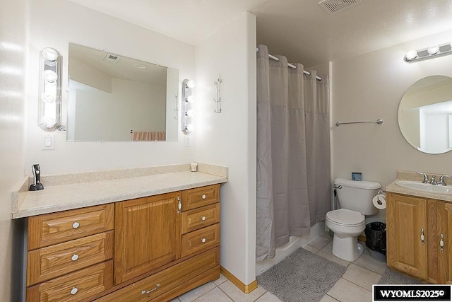 full bath featuring visible vents, vanity, toilet, and tile patterned floors