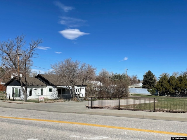 view of road with sidewalks and curbs