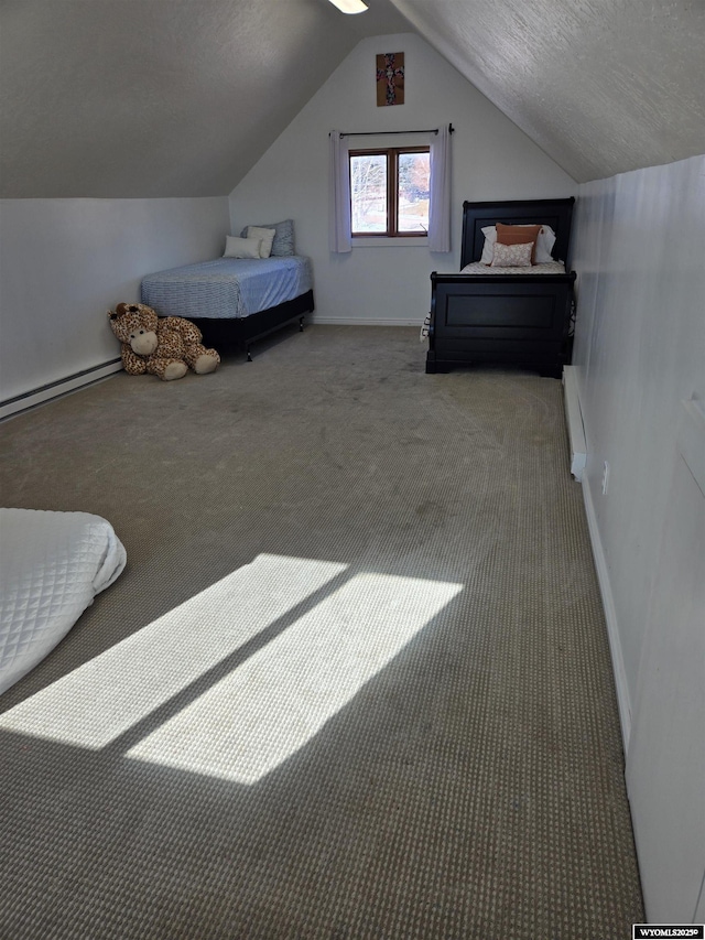 unfurnished bedroom featuring a baseboard heating unit, carpet flooring, vaulted ceiling, a textured ceiling, and baseboards