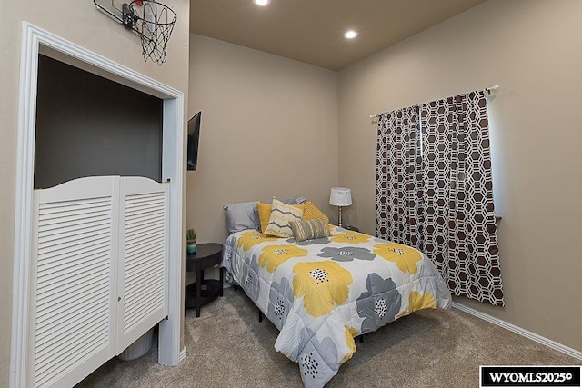 carpeted bedroom with recessed lighting