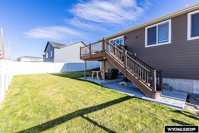 view of yard with a fenced backyard, a patio, stairway, and a wooden deck