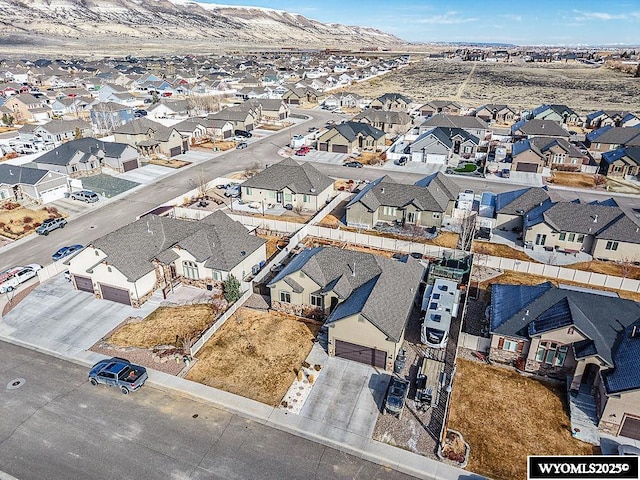 birds eye view of property with a residential view