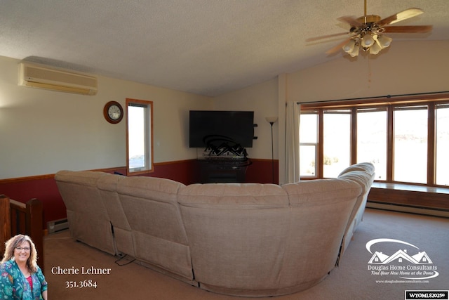 carpeted living room featuring lofted ceiling, a wall mounted AC, a baseboard radiator, and plenty of natural light