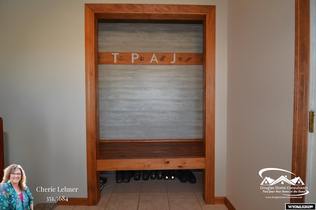 mudroom with tile patterned flooring