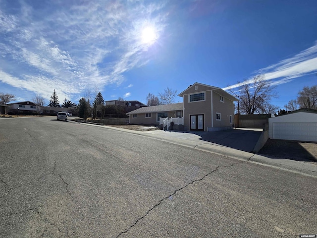 view of road with sidewalks and curbs