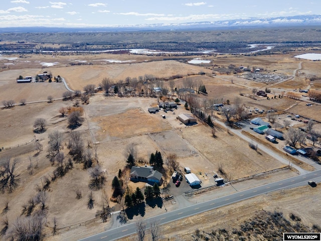 aerial view featuring view of desert and a rural view