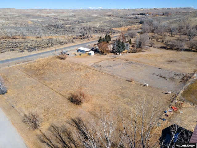 bird's eye view with a rural view and a mountain view