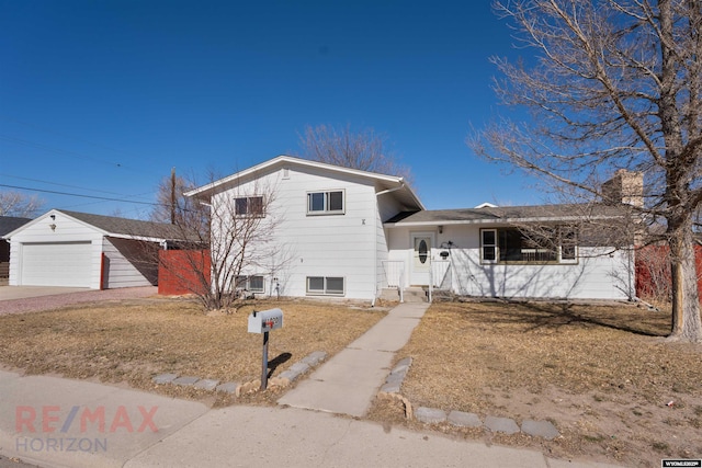 split level home featuring a garage