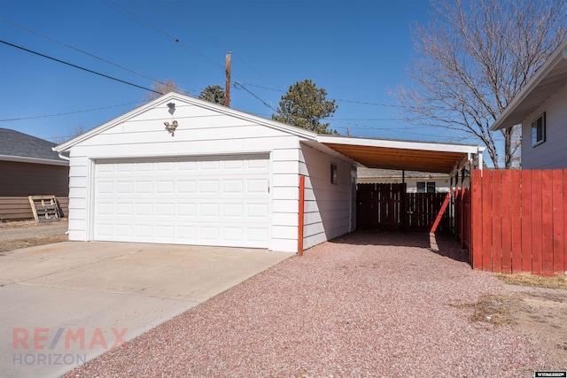 garage featuring fence