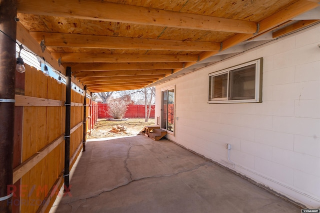 view of patio featuring fence