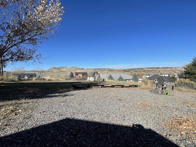 view of yard with a mountain view