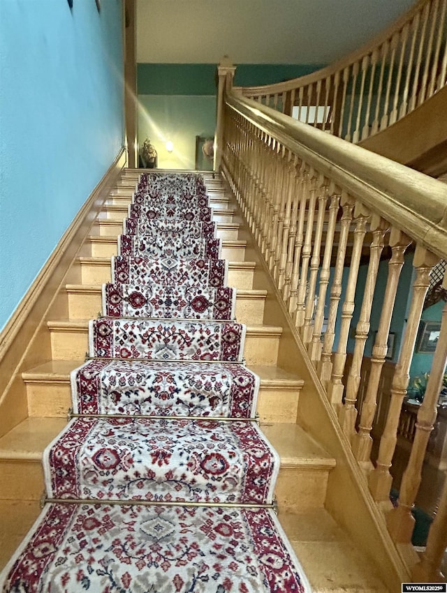 stairs with wainscoting