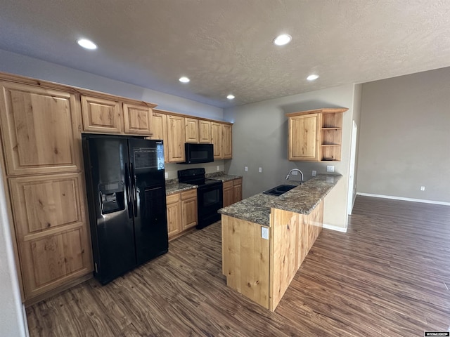 kitchen with open shelves, a peninsula, a sink, dark wood-style floors, and black appliances