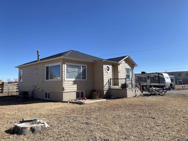 view of front of house with fence