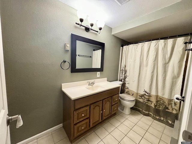 full bathroom with baseboards, toilet, tile patterned flooring, a textured ceiling, and vanity