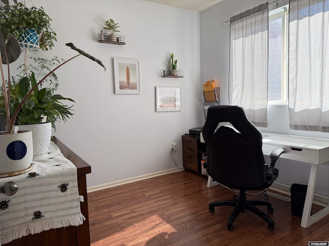 office area with wood finished floors and baseboards