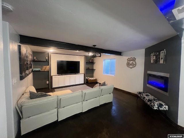 living room featuring baseboards, finished concrete floors, and visible vents